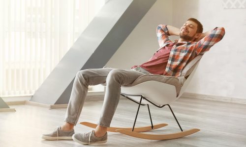 man-relaxed-on-rocking-chair